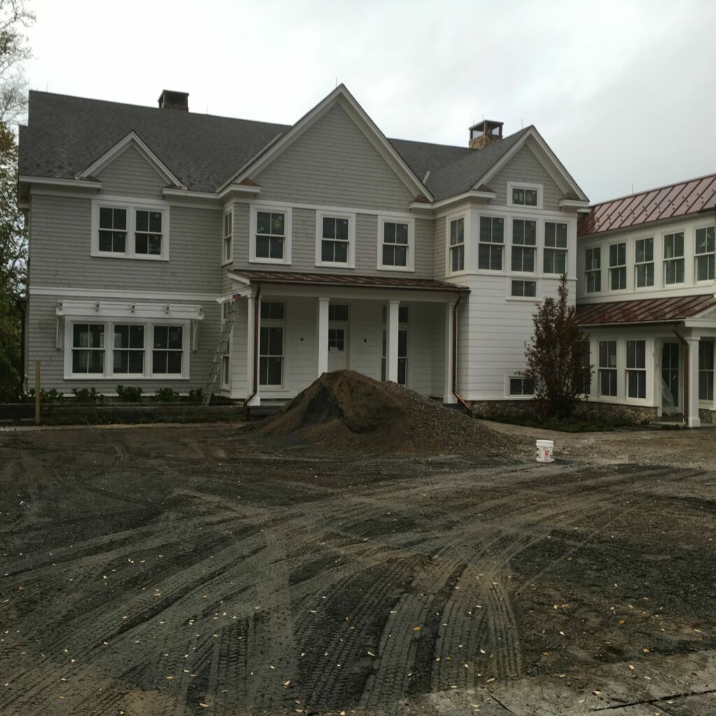 Exterior trim and shiplap side wall painted by IAP Inc. in Woods Hole, Falmouth MA.