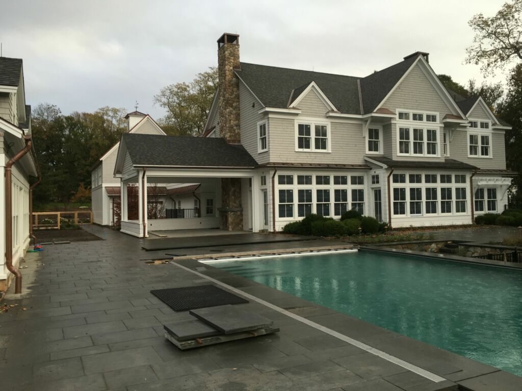 Exterior trim and shiplap side wall painted by IAP Inc. in Woods Hole, Falmouth MA.