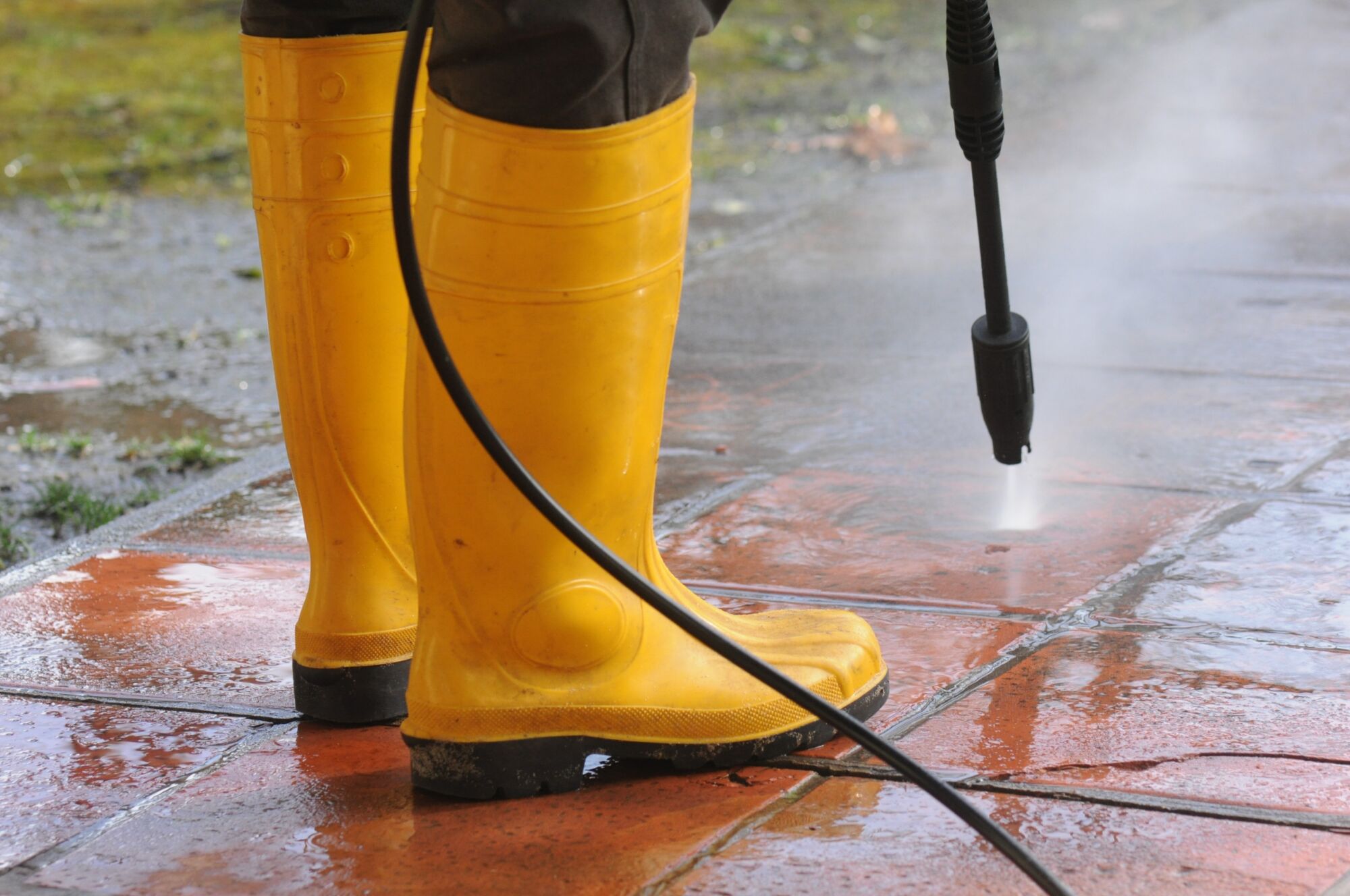 Professional Power Washing Services for Houses, Decks, Stones & Pools | IAP Inc Power washing exterior house siding, deck, stone patio, and pool area by IAP Inc to remove dirt and restore cleanliness.